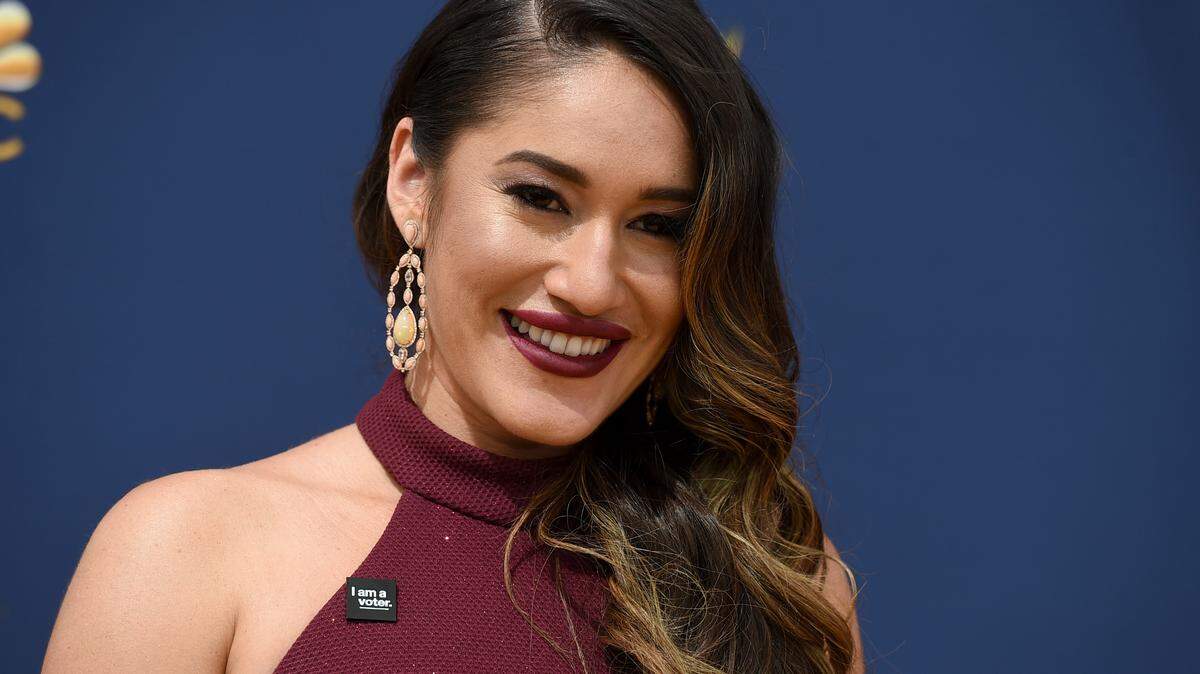 FILE - Q’orianka Kilcher arrives at the 70th Primetime Emmy Awards on Sept. 17, 2018, in Los Angeles. “Yellowstone” actor Kilcher has been charged with illegally collecting nearly $97,000 in disability benefits while working on the TV show, authorities announced, Monday, July 11, 2022. (Photo by Jordan Strauss/Invision/AP, File)