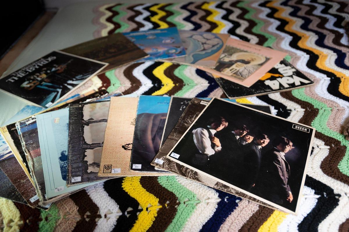 Vinyl records are displayed for sale on a crochet blanket in The Bus Stop Vintage on March 4.
