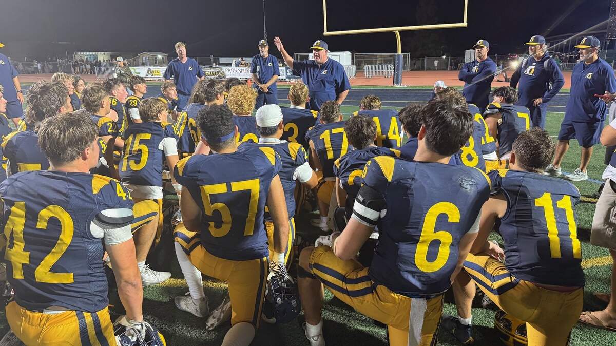 Oak Ridge head coach Casey Taylor addresses his team after the Trojans defeated the visiting St. Mary’s Rams, 56-35, on Friday in El Dorado Hills and handed the Rams their worst loss since 2019.