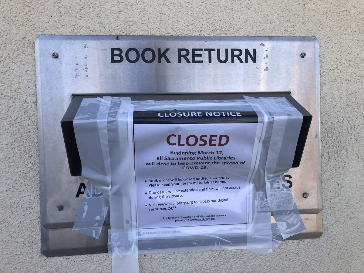 The book drops at the Carmichael branch of the Sacramento Public Library remain sealed off March 26, 2020. Library officials agreed to keep all 28 branches closed through April 10 and continue to pay workers.