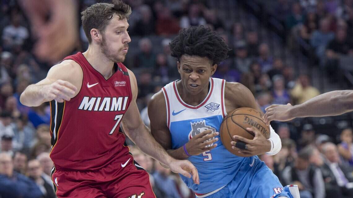 After shaky fourth quarter, Kings hold on for an overtime win over the Heat