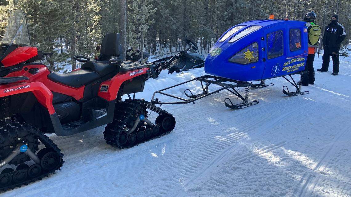 A snowmobiler was rescued near Yellowstone after crashing into a tree, Montana officials said.