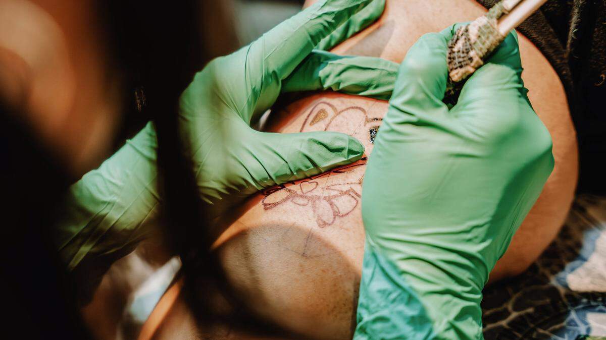 Alex Clark tattoos the Pokémon Jigglypuff on a client at Les Tattoos, which she owns. Les Tattoos is currently the largest LGBTQ+ led tattoo shop on the West Coast, according to Maricelia Dominguez. 