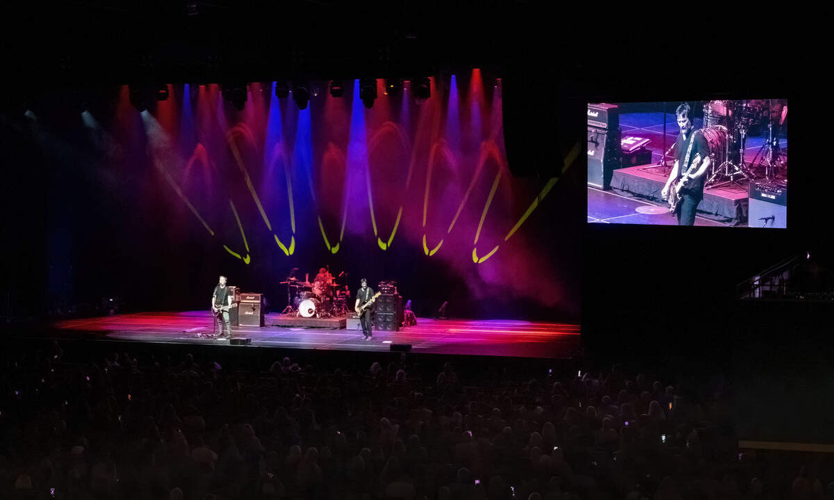 Lead vocalist Bret Domrose, left, drummer Robert Mailhouse and bassist Keanu Reeves perform as Dogstar on Saturday, Sept. 14, 2024, at the Hard Rock Live Sacramento near Wheatland.