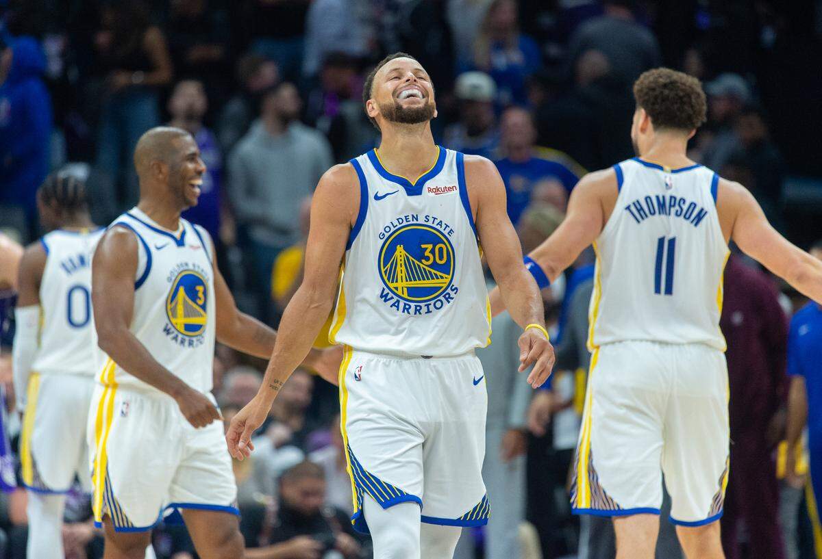 Golden State Warriors guard Stephen Curry (30) reacts after scoring against the Sacramento Kings at Golden 1 Center on Friday.