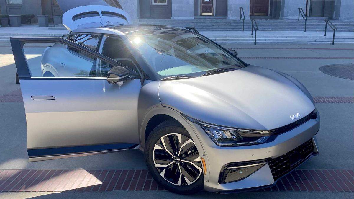 A Kia EV6, Kia’s new electric vehicle released earlier this year, sits out front of the California State Capitol for publicity.