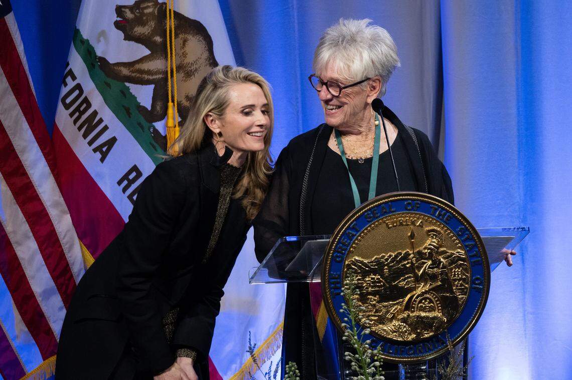 First Partner Jennifer Siebel Newsom shares a moment with artistic director and choreographer Brenda Way as she speaks after being inducted into the California Hall of Fame on Tuesday, Feb. 6, 2024, at the California Museum in Sacramento.