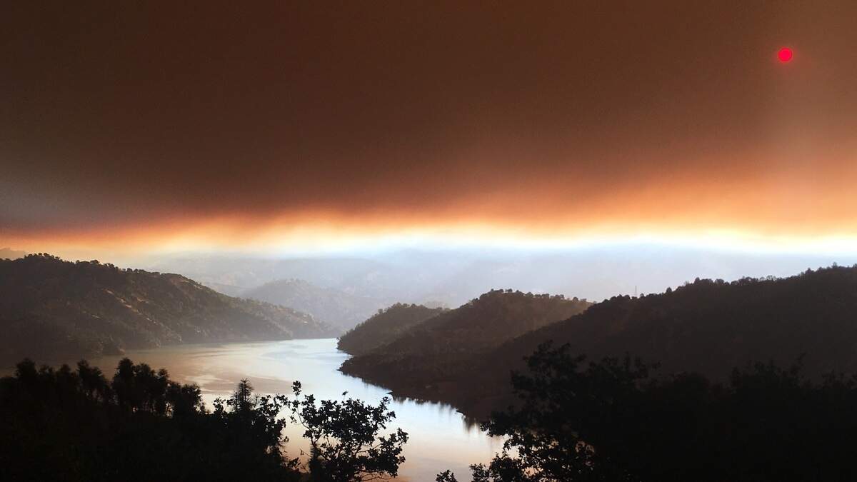 Smoke from the County Fire can be seen over Lake Berryessa on Sunday, July 1, 2018.