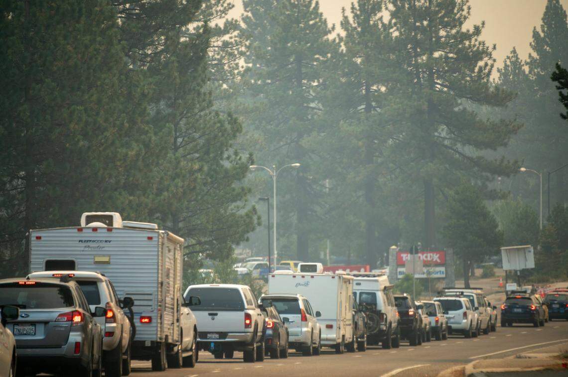 Traffic is backed up on Highway 89 heading north toward the junction with Highway 50 as South Lake Tahoe residents evacuate to the east as the Caldor Fire approaches their city on Monday, Aug. 30, 2021.