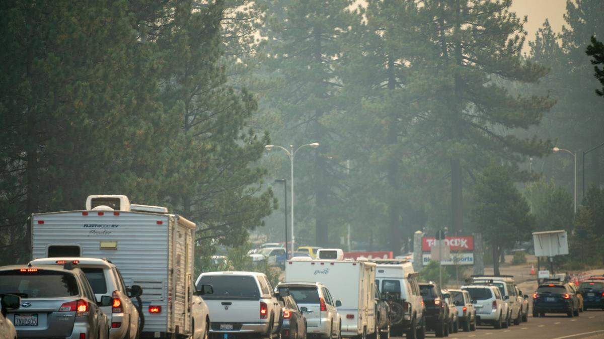 Traffic is backed up on Highway 89 heading north toward the junction with Highway 50 as South Lake Tahoe residents evacuate to the east as the Caldor Fire approaches their city on Monday, Aug. 30, 2021.
