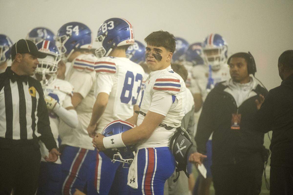 Folsom Bulldogs quarterback Ryder Lyons (3) watched most of the Dec. 12 CIF Division 1–AA State Championship against the Cathedral Catholic Dons from the sidelines due to an injury sustained the week before. 