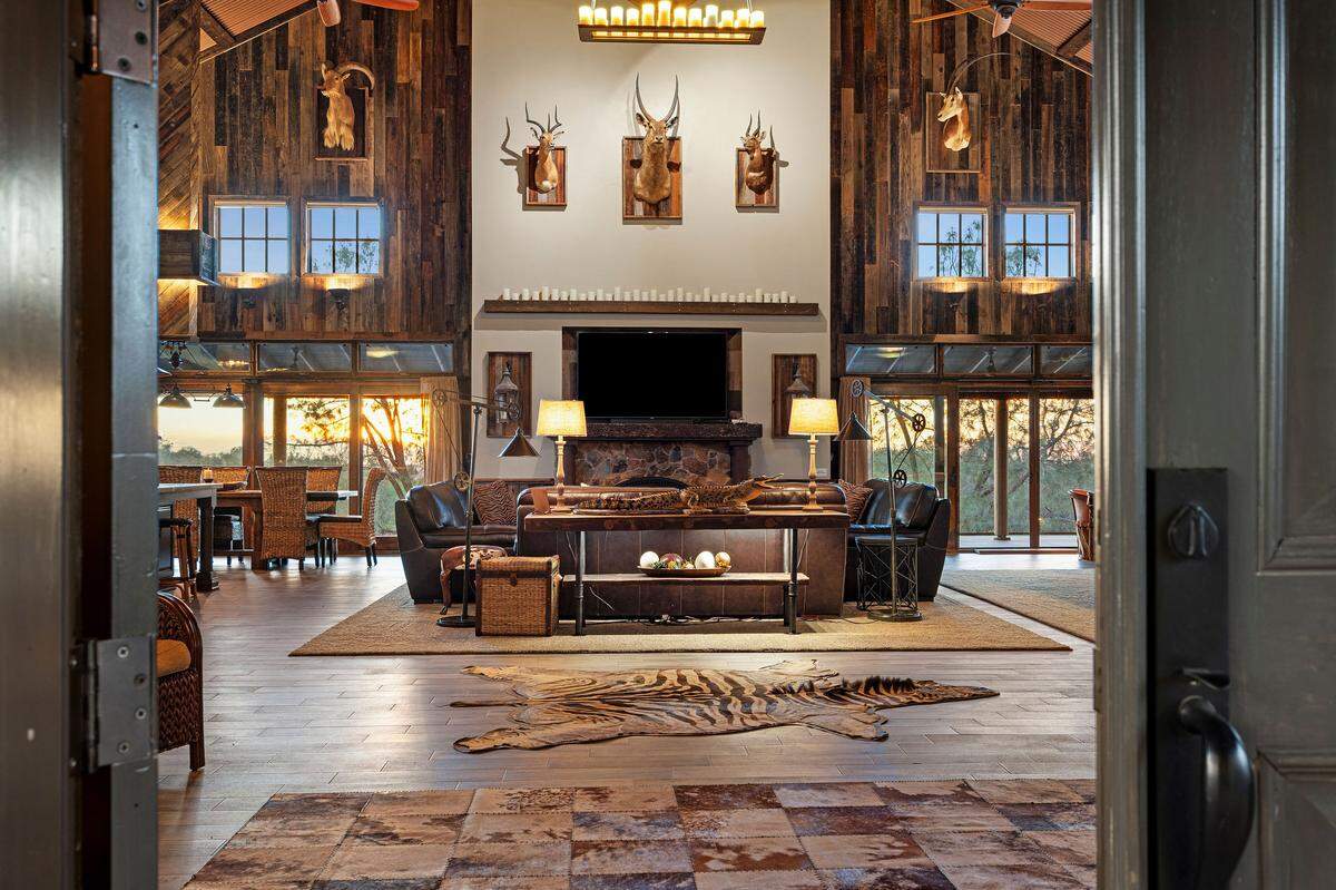 The lodge’s great room — a 1,600-square-foot gathering space — combines kitchen, dining and living areas.