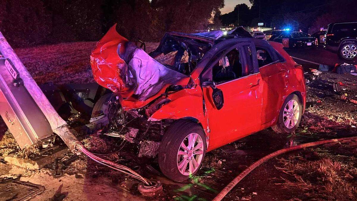 A red Hyundai that was reported stolen and fleeing in a California Highway Patrol pursuit Monday evening, July 29, 2024, crashed with a Rivian SUV at the intersection of Murieta Parkway and Jackson Road in Rancho Murieta.