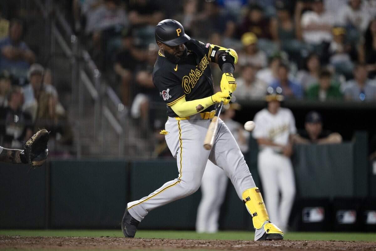 Pittsburgh Pirates designated hitter Marcell Ozuna hits a solo home run off Athletics pitcher Scott Barlow in the top of the seventh inning Wednesday at Sutter Health Park in West Sacramento.
