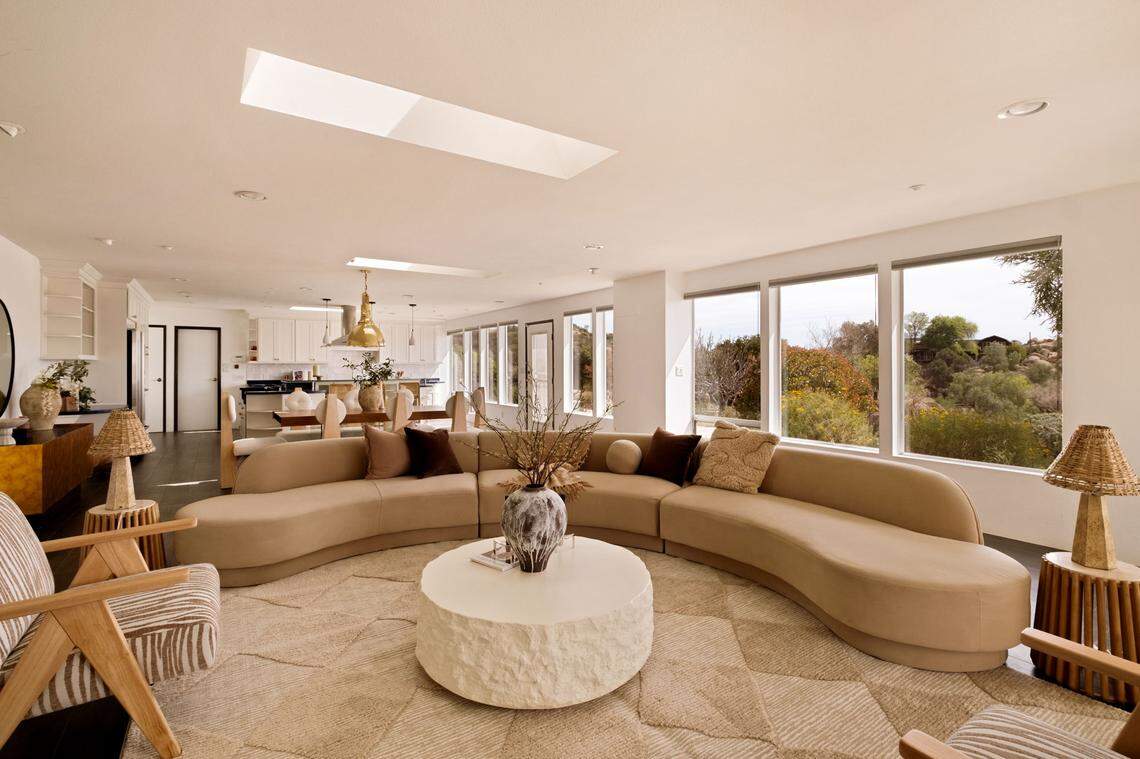 Built with fire-resistant materials for enhanced safety, the home is surrounded by a National Wildlife Federation-certified habitat and drought-tolerant gardens.