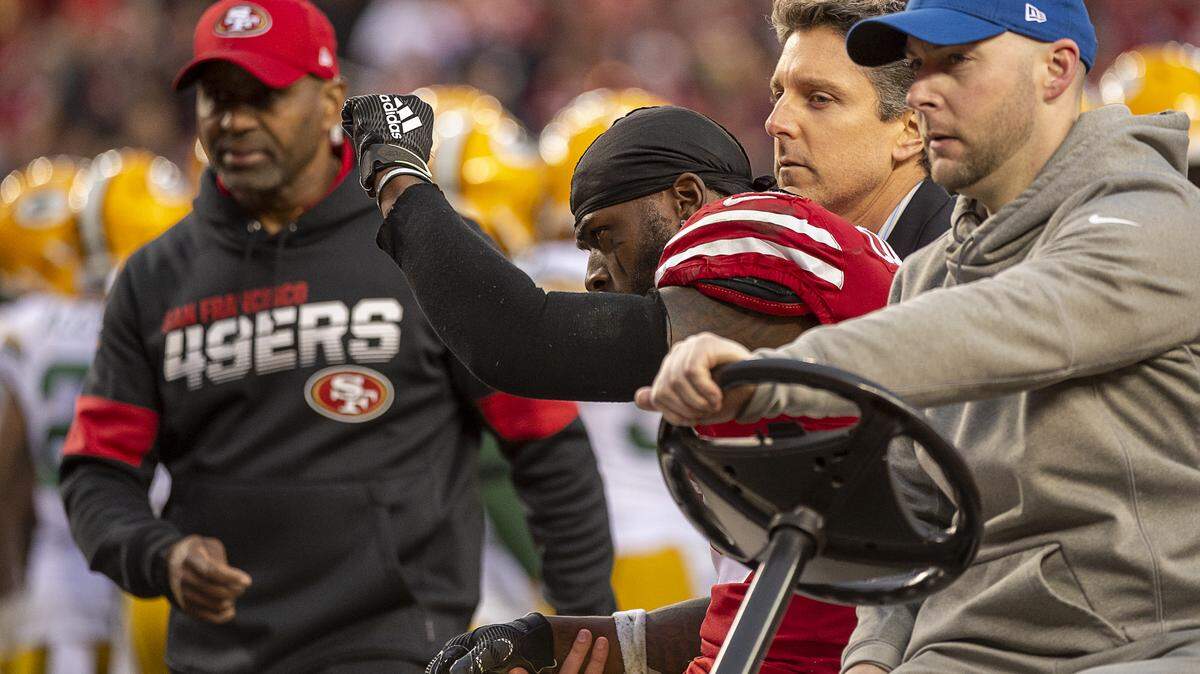 San Francisco 49ers running back Tevin Coleman (26) signals to the crowd as he is carted off the field after being hurt in the second quarter during the NFC Championship at the Levi’s Stadium on Sunday, Jan. 19, 2020 in Santa Clara.