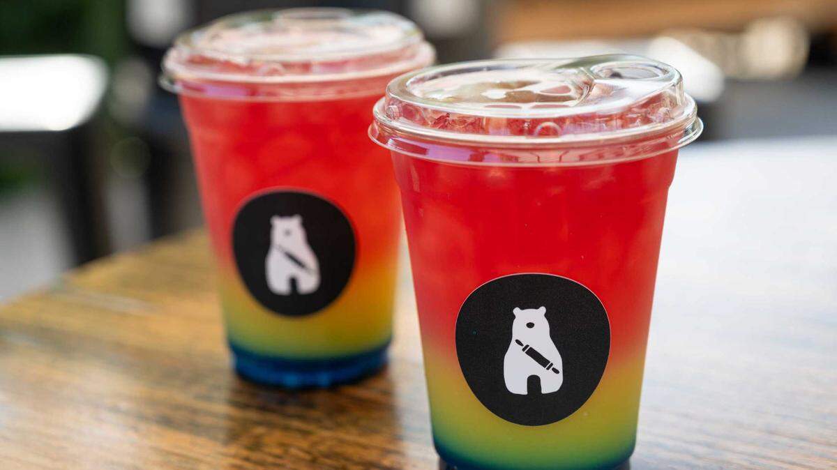 A Rainbow Refresher drink made with blue raspberry syrup, orange juice, and tropical hibiscus tea is available at Forgotten Bakery in Sacramento for Pride Month on Tuesday. For every refresher sold, co-owners Robby Naim and Paul Dollar donated $5 to the Sacramento LGBT Center.