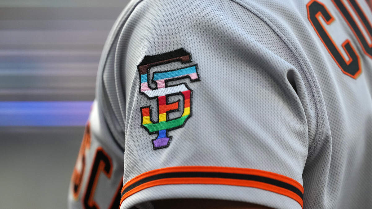 A rainbow colored San Francisco Giants logo on the sleeve of left fielder Michael Conforto (8) during LGBTQ+ Pride Night at Dodger Stadium at Dodger Stadium on June 16.