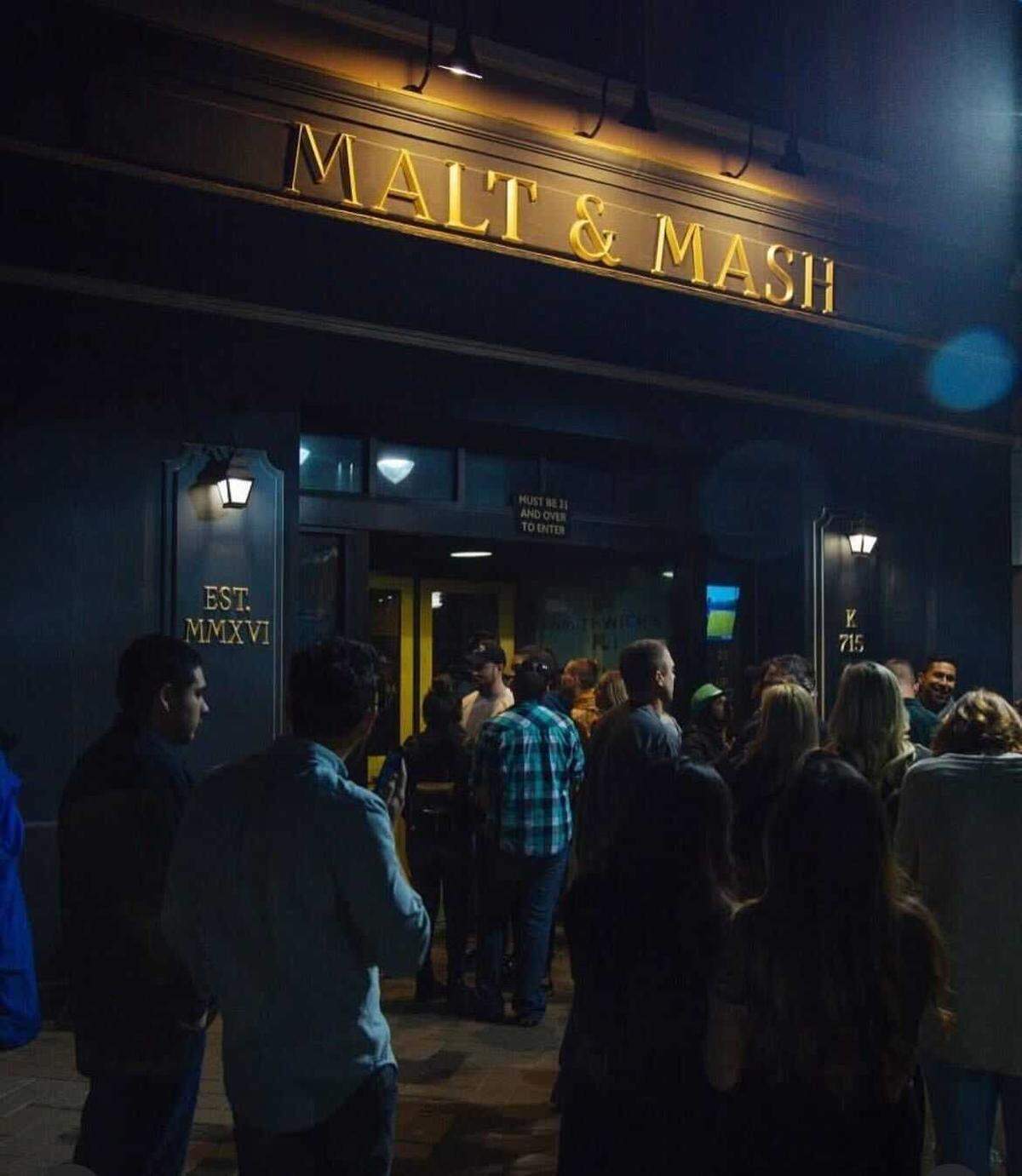 Crowds lined up to get inside of Malt and Mash, an Irish pub located at 715 K St. in downtown Sacramento. Malt and Mash is expected to close and reopen as a new venture in fall 2025.