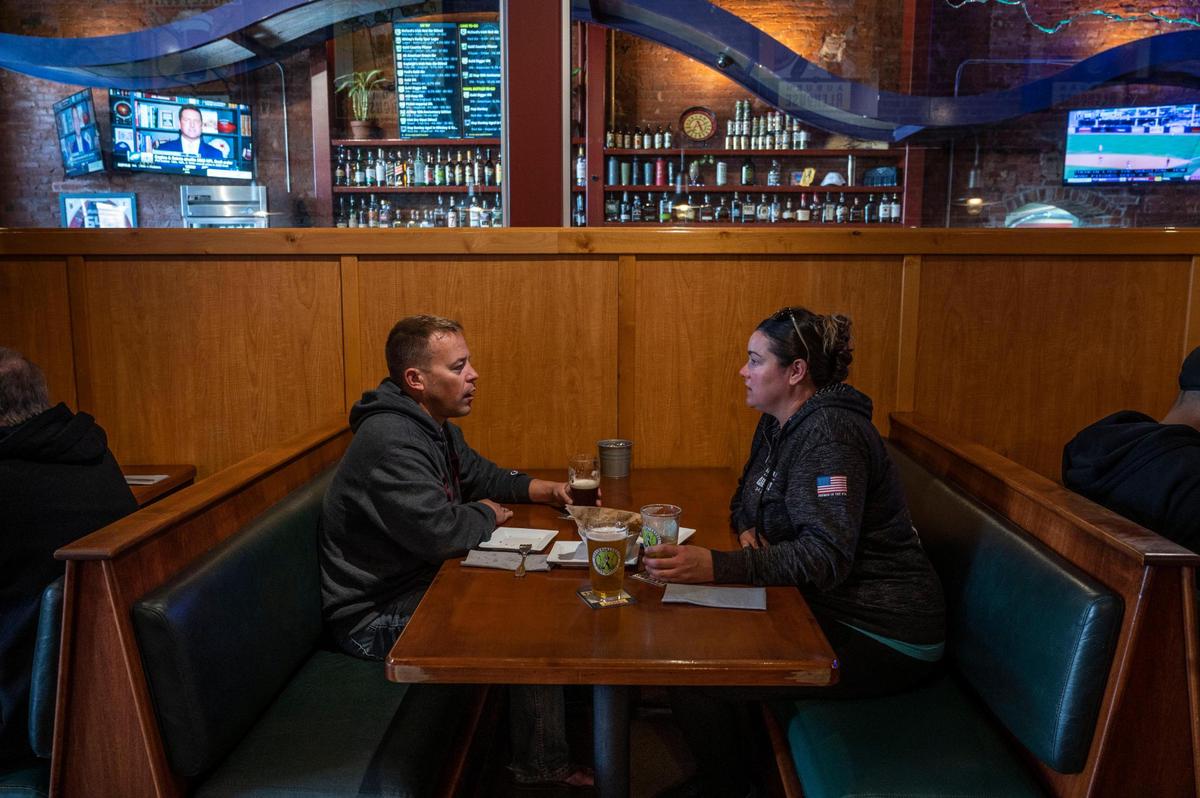 Shaun and Jessika Rutledge of Roseville enjoy a beer and some food at Auburn Alehouse in Auburn on April 5.