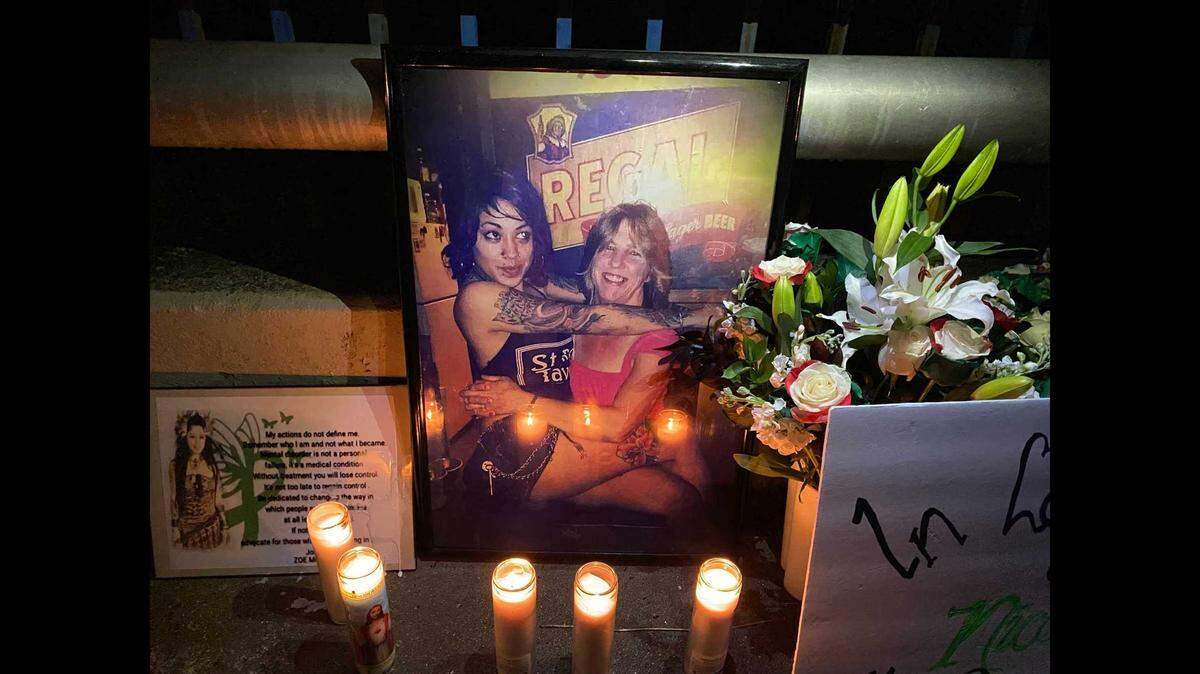 Nicole “Zoe” Bueno, and her mother, Gail Leisure are pictured at a New Orleans bar several years ago. The picture was placed on a bridge spanning over Morrison Creek near Steiner Drive during a vigil grieving Bueno’s death. Bueno was found dead by Leisure in the creek’s frigid waters on Dec. 3.
