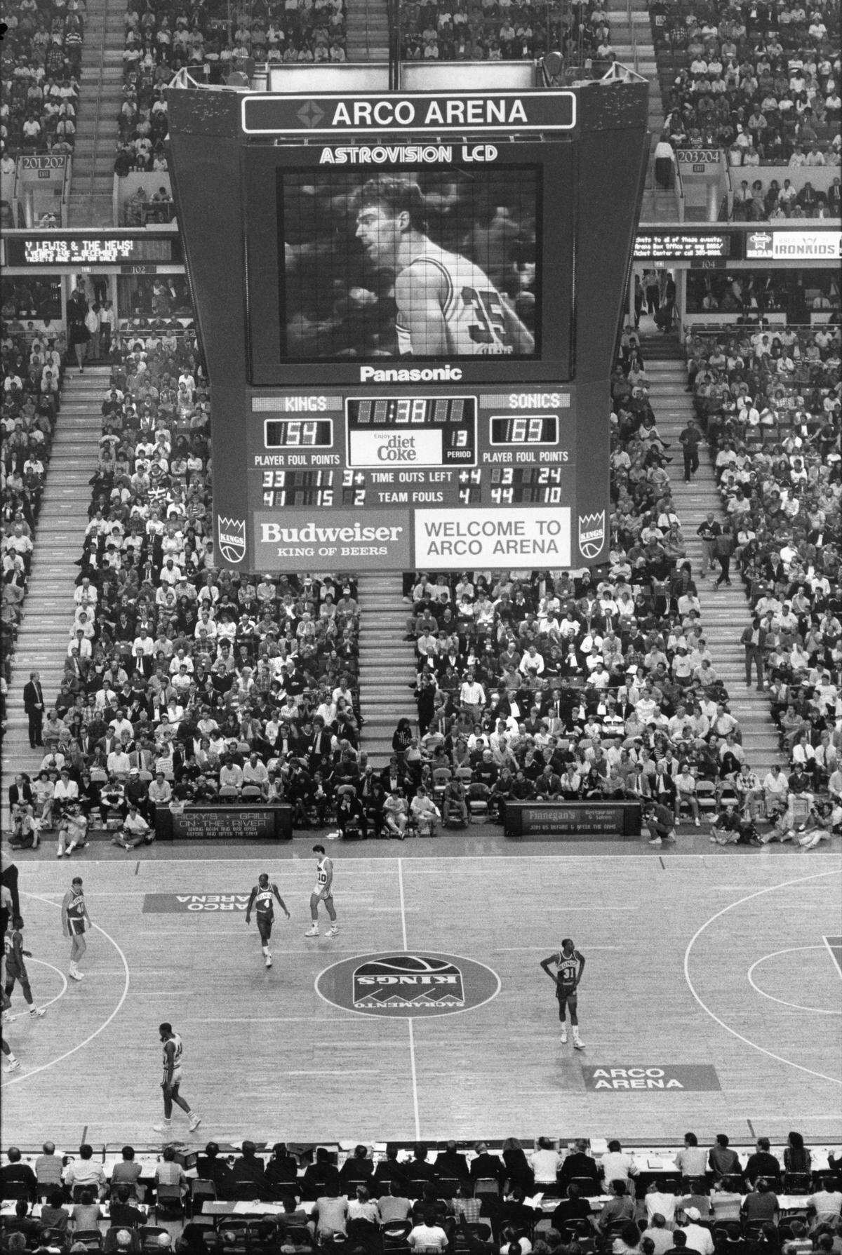 “Joe Kleine is bigger than life on the scoreboard’s huge video screen” reads the original caption published with this photo from the Sacramento Kings’ first game at the second Arco Arena on Nov. 8, 1988. The team lost to Seattle 97-75 with NBA Commissioner David Stern on hand for the debut night. An adjacent article reviewed the building: “If this building has any charm, … it’s because Sacramento architect Rann Haight was able to preserve much of the high-school-gym feel from the Kings’ old match-box arena.”
