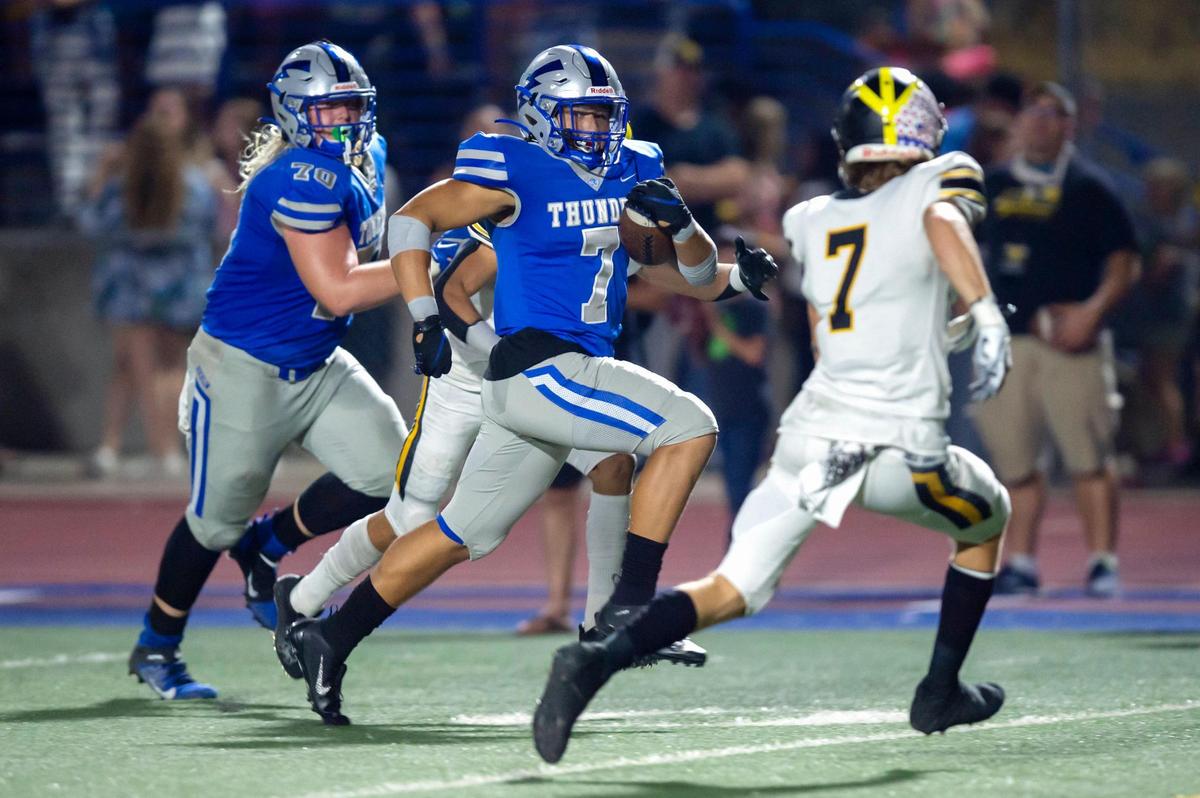 Rocklin’s Elias Brown runs the ball just short of the goal before being tackled by Del Oro’s Isaiah Moore at Rocklin High School in 2021. Brown is joining the Sacramento State football team.