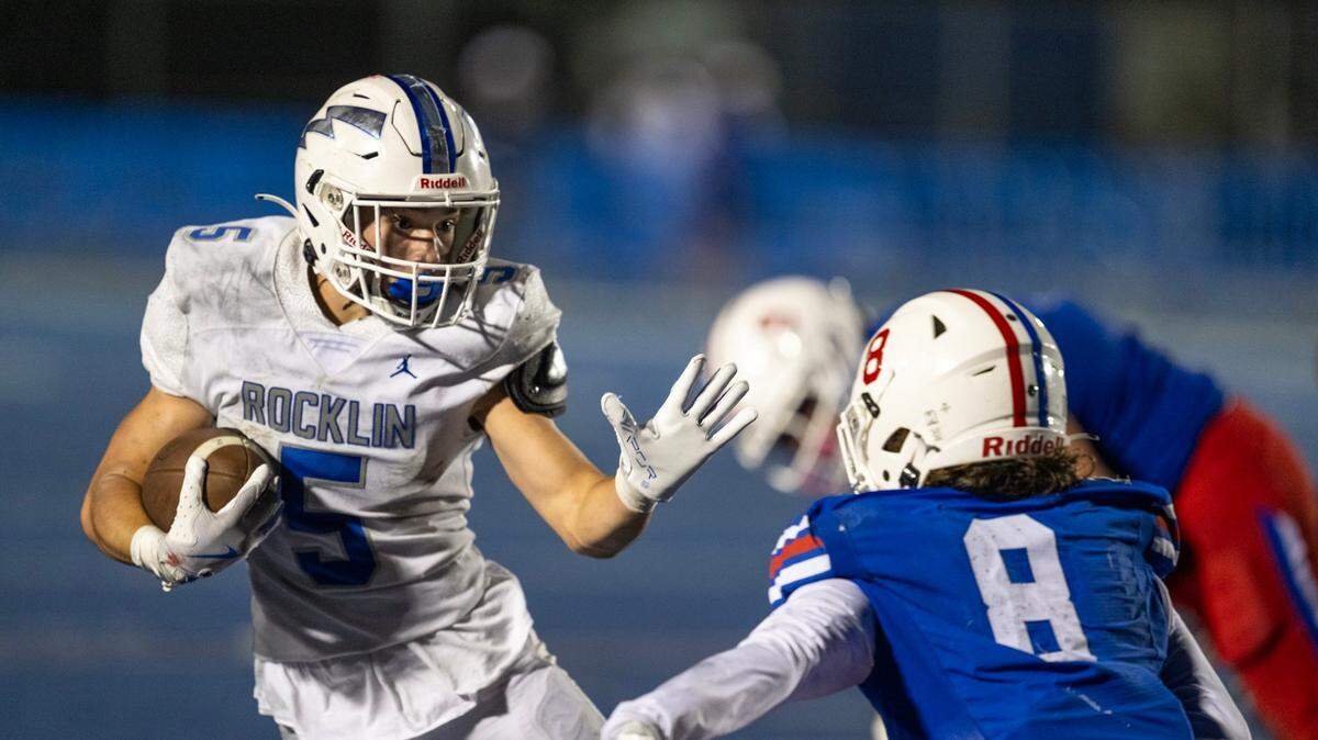 Rocklin Thunder running back Derek Keeley (5) tries to evade the Folsom Bulldogs’ Joaquin Rodriguez (8) in the fourth quarter on Sept. 20. No. 2 Rocklin will play No. 20 Whitney this week. 