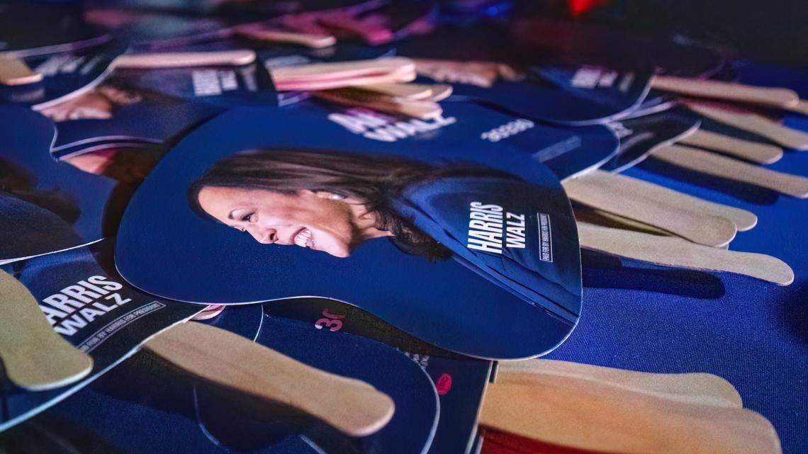 Harris-Walz signs sit on a table before a campaign stop for Democratic presidential candidate Vice President Kamala Harris at the Reno Events Center on Thursday, Oct. 31, 2024.