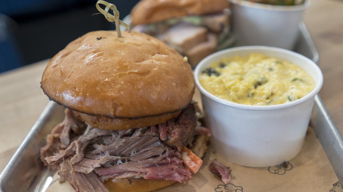 Pulled pork and grits at Urban Roots on Sunday, Aug. 19, 2018, in Sacramento.