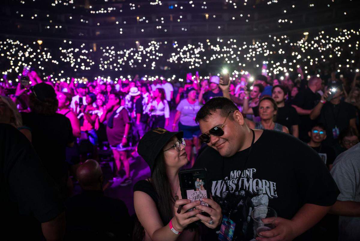 Sarah Mendoza and Thomas Mendoza take a selfie between sets at Snoop Dogg’s High School Reunion Tour in August at Golden 1 Center.