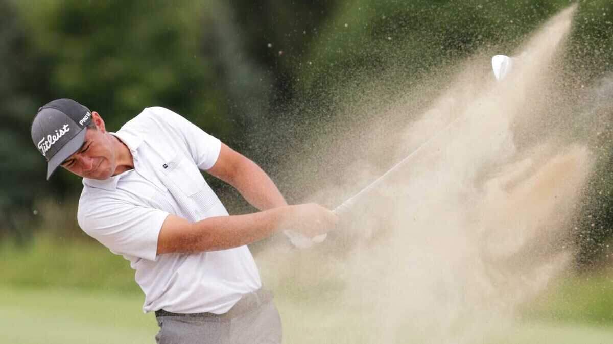 Corey Pereira hits out of a bunker on the eighth hole during the final round of the Forme Tour Birck Boilermaker Classic on July 31, 2021, in West Lafayette, Indiana.