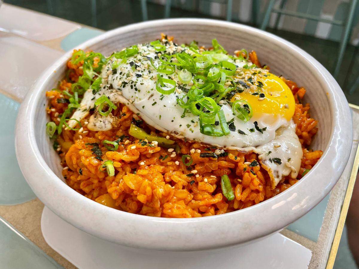 Southside Super’s kimchi fried rice includes Spam and is topped with a fried egg.