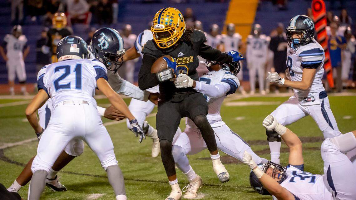 Grant Pacers Akil Sohan (8), runs with the ball during the first quarter as the Grant Pacers host the Downey High School Knights, in the first round CIF playoff game, Friday Nov 2, 2018.  

