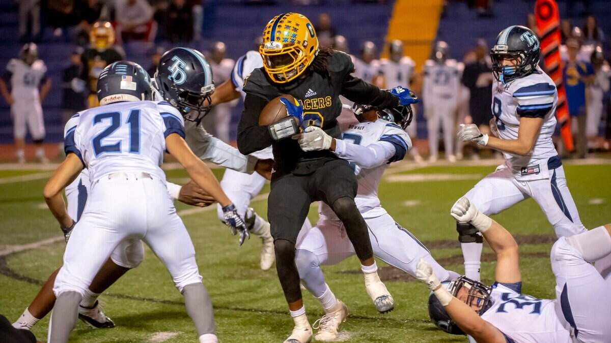 Grant Pacers Akil Sohan (8), runs with the ball during the first quarter as the Grant Pacers host the Downey High School Knights, in the first round CIF playoff game, Friday Nov 2, 2018.  
