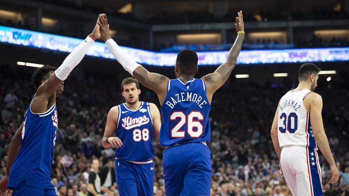 Sacramento Kings guard Kent Bazemore (26) and Sacramento Kings guard Buddy Hield (24) celebrate a score during a game at the Golden 1 Center on Thursday, March 5, 2020 in Sacramento.