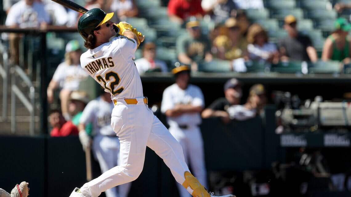 A’s overpower Reds, winning 7 to 4 thanks to 4 home runs