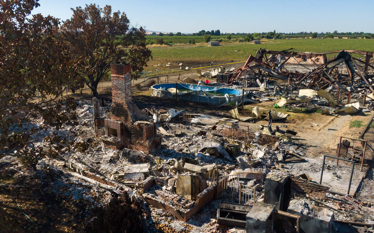 The chimney is all that remains of the home that once stood at the Esparto fireworks explosion site on Friday, July 18, 2025, the first day the evacuation order and area road closures were lifted.