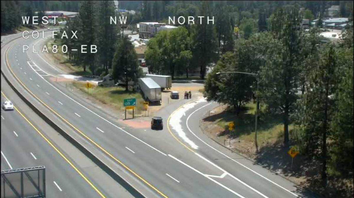 A disabled big rig is seen on the Colfax offramp of Interstate 80 following an oil spill Sunday, May 24, 2026.