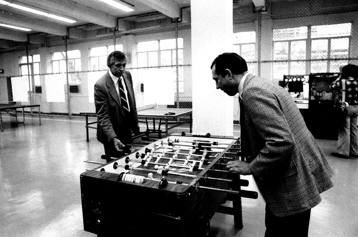 Sacramento Sheriff Robbie Waters, left, tests the foosball table during a tour of the jail at 620 H Street on Jan. 26, 1983.
