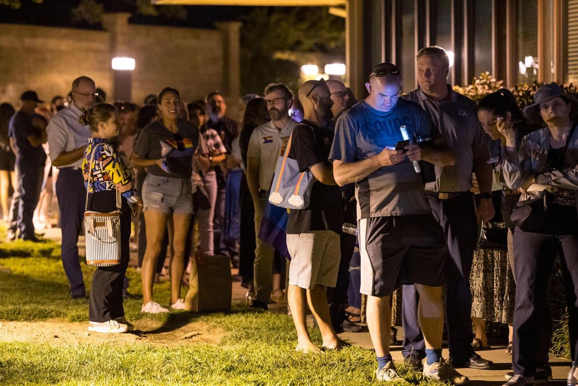A line wraps around the building as Rocklin teachers, community members, parents and students wait for hours to comment during the Rocklin Unified School District Board meeting Wednesday, Sept. 6, 2023, where a proposed policy requiring schools to violate state law by “outing” transgender students to their parents is on the agenda. The board passed the policy that would require staff to notify families within days of a student’s choosing to be identified as any name, nickname, or gender that does not match enrollment records or is not a “common” nickname recognized by the school.