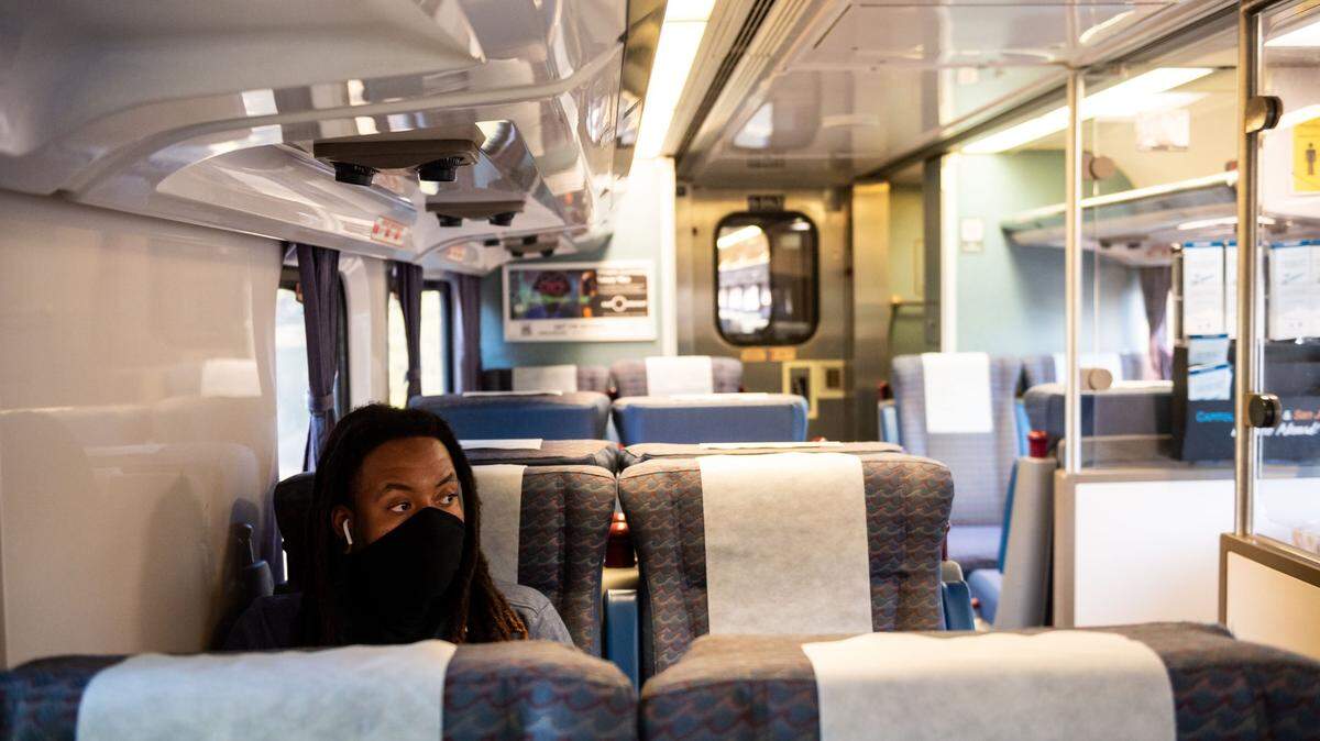 Micheal Lee, a Sacramento resident who commutes to San Francisco for work as a systems administrator, rides a mostly empty Amtrak Capitol Corridor train Friday, Aug. 7, 2020, back to Sacramento.