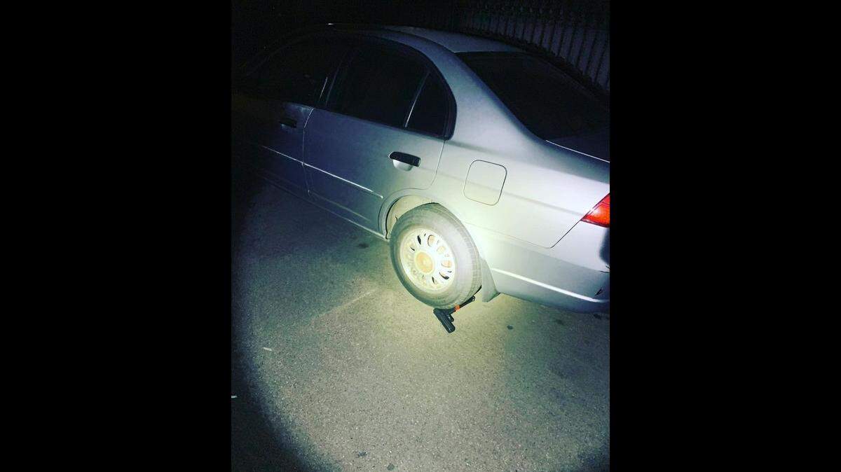 A man who tossed a gun while fleeing police was arrested when he returned to look for it, California authorities said. 