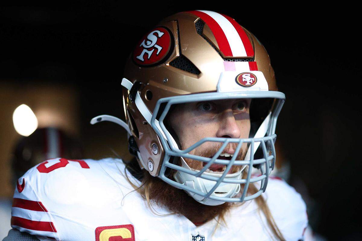 San Francisco 49ers tight end George Kittle looks on before an NFC wild card playoff game against the Eagles in Philadelphia on Jan. 11. He is currently rehabbing from an Achilles tear and may miss some of the 2026 season.