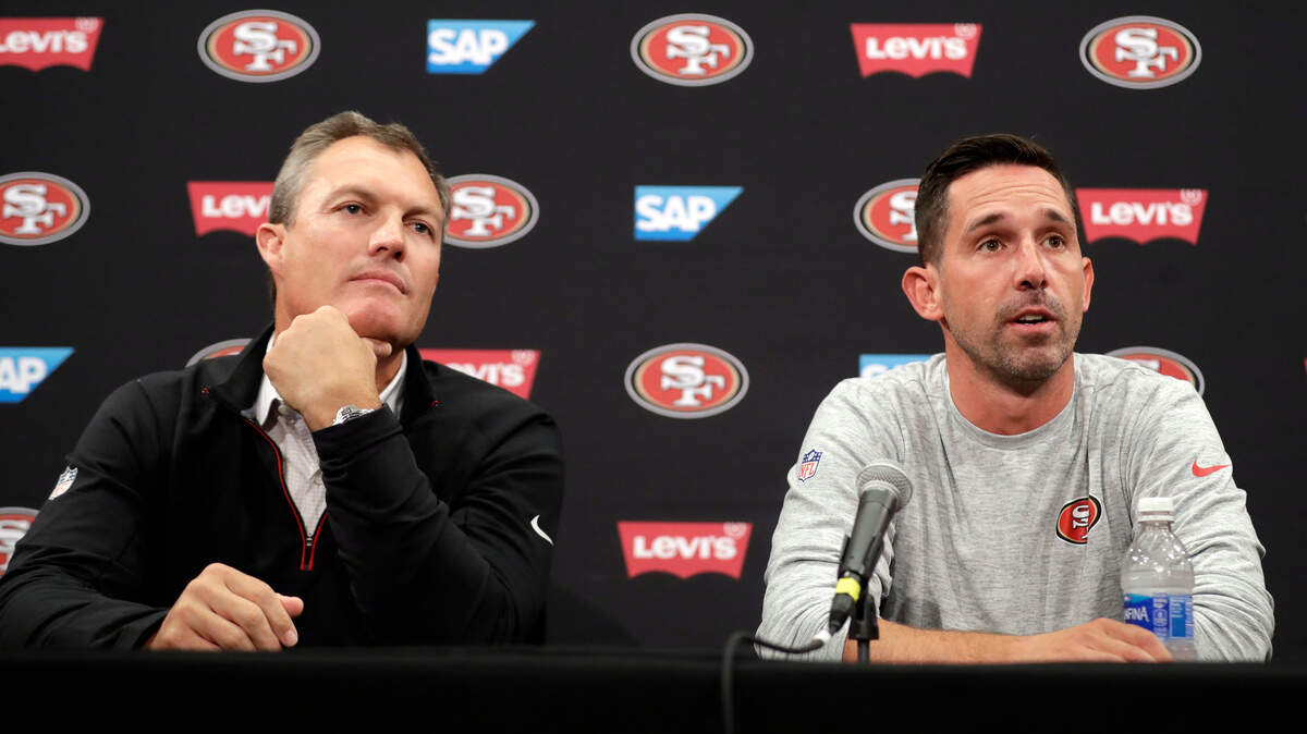 The 49ers have the 13th and 31st picks in the NFL draft, which begins Thursday. As of Wednesday afternoon, it remains to bee seen if general manager John Lynch, left, coach Kyle Shanahan and San Francisco keep those picks or trade at least one for more selections.