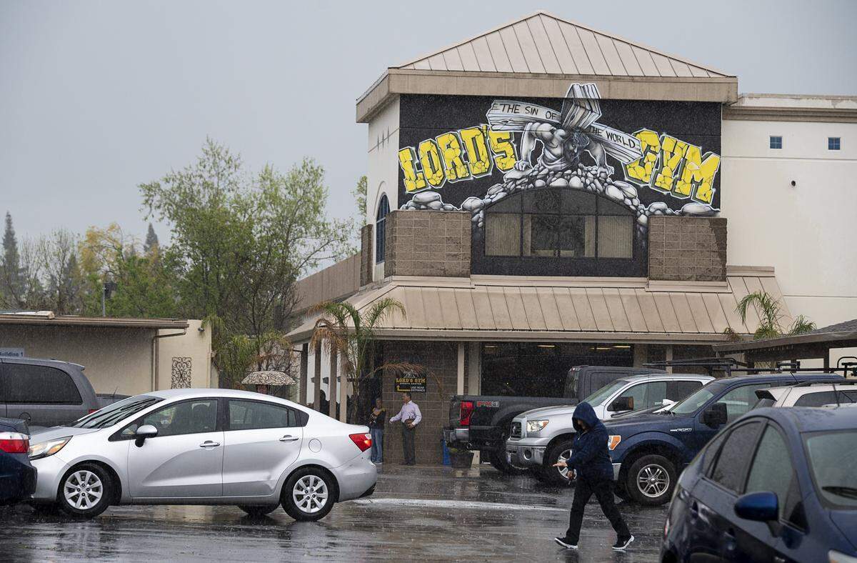 Abundant Life Fellowship church members leave the last live service to a full parking lot after Pastor Doug Bird announced service will now be conducted by live stream during the coronavirus pandemic on Sunday, April 5, 2020 in Roseville.
