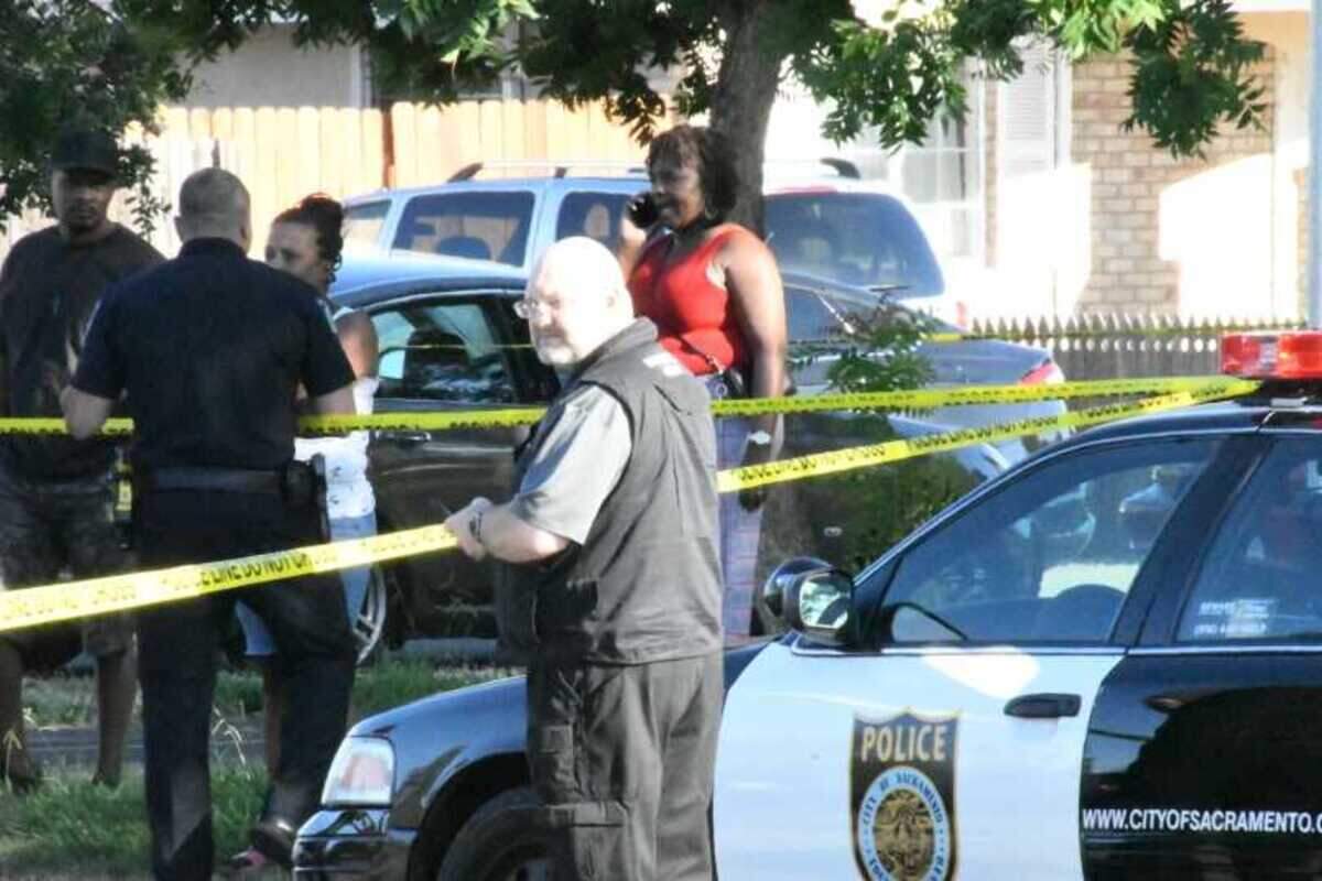 Police at the scene of a shooting in the 900 block of North Avenue in the Del Paso Heights neighborhood of Sacramento, Saturday, Sept. 21, 2019. Syncere Dixon, 19, was killed.