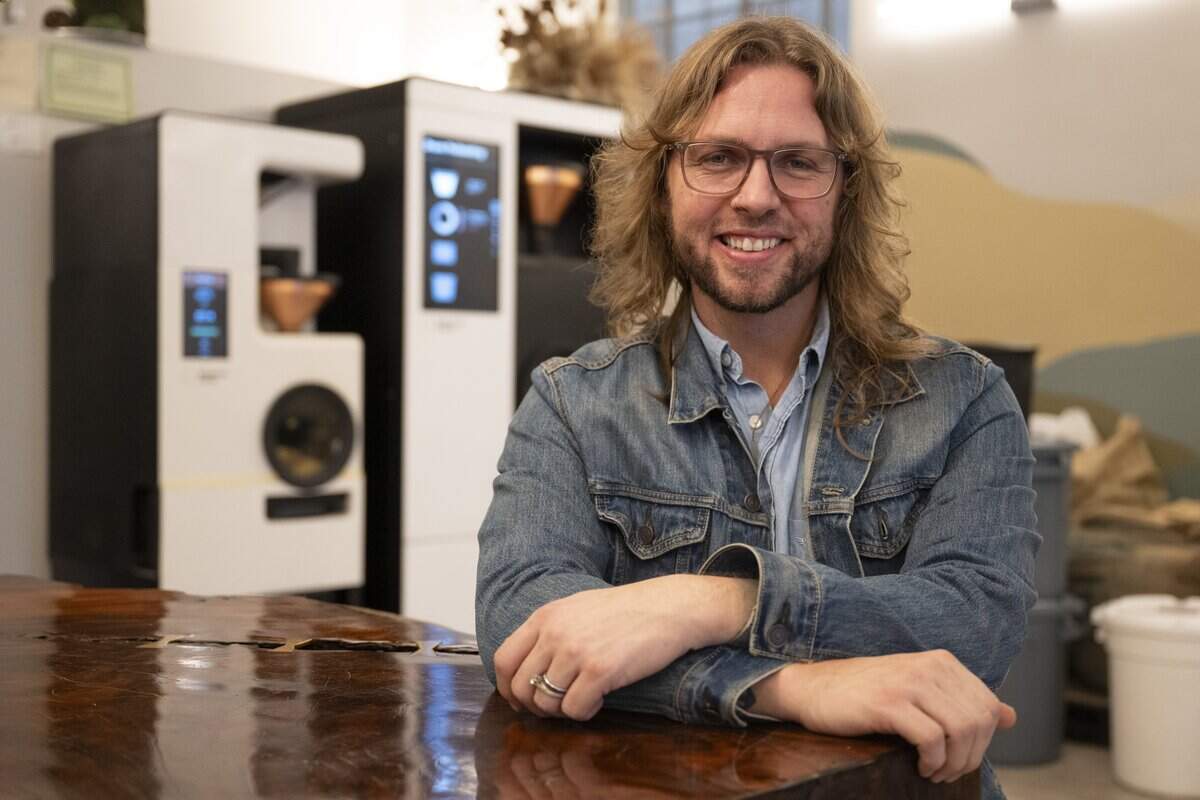 Donovan Albert, co-founder of Anchor & Tree Coffee Roasting Company, poses for a portrait at the Sacramento coffee shop on Monday, Jan. 12, 2026. Albert says Anchor & Tree is one of the only coffee shops in Sacramento using a Bellwether Coffee machine, which is an all-electric coffee roaster.