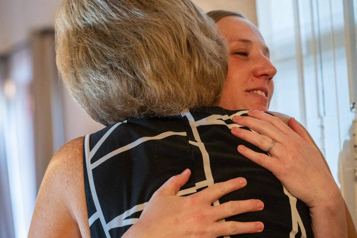 Azelyn Failor is hugged at the memorial service for her mother Machelle Wilson at the Woman’s Club of Lincoln earlier this month. Wilson was a UC Davis biostatistician who was hit by a car while crossing a Sacramento County street in October and died last month.