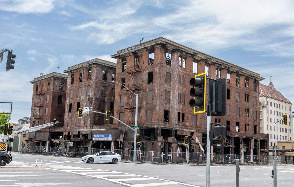 The historic Hotel Marysville, which burned down over the weekend, is seen on Thursday. Caltrans shut down traffic on Highway 70 in downtown Marysville because of fears the building, which has been vacant since 1985, might collapse.
